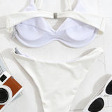 Bikini set z metalno zaponko v enotni barvi