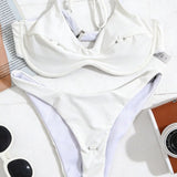 Bikini set z metalno zaponko v enotni barvi