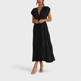 Paula - Elegantna plisirana obleka" can be rewritten as "Paula - Elegant Pleated Dress.