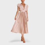 Paula - Elegantna plisirana obleka" can be rewritten as "Paula - Elegant Pleated Dress.