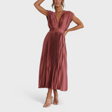 Paula - Elegantna plisirana obleka" can be rewritten as "Paula - Elegant Pleated Dress.