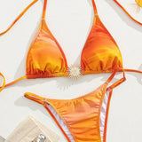 Bikini set s halterjem in kovinskimi detajli v gradientnem tisku